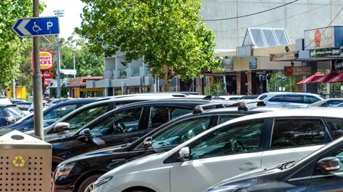 cars parked in shopping precinct