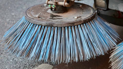 close up of street cleaner brushes