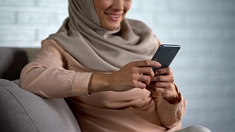 a woman using a mobile phone