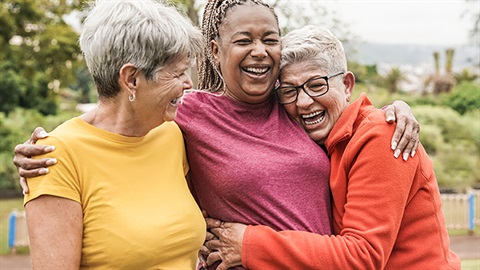 three women laughing