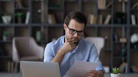 A person with a laptop in front