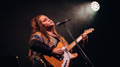 Guitarist playing on stage at the FUSE Festival