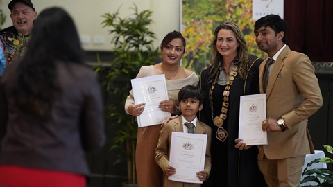 Three new Australian citizens with Cr Julie Williams at a Darebin citizenship ceremony