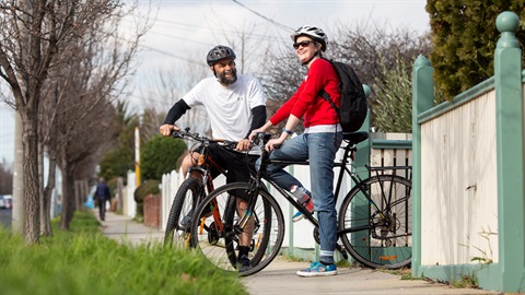 Two people about to go bike riding