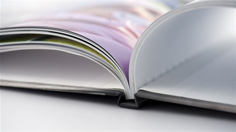 Photograph of an open book on a table