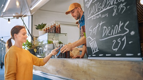 Paying at a mobile food truck