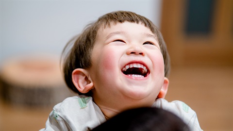 3 year old boy laughing