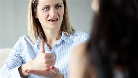 women using sign language