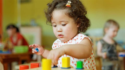 child playing with blocks