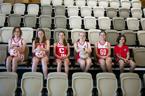 Netball team in stadium.jpg