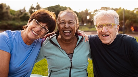 Older people in a park having heaps of fun