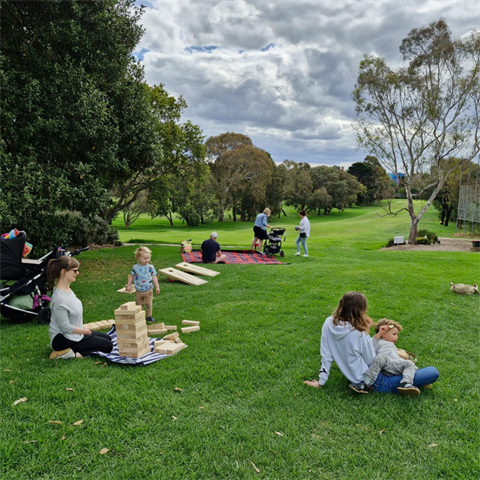 people listening to music on the lawn