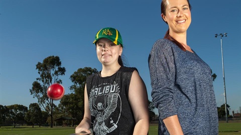 Two people on sports field