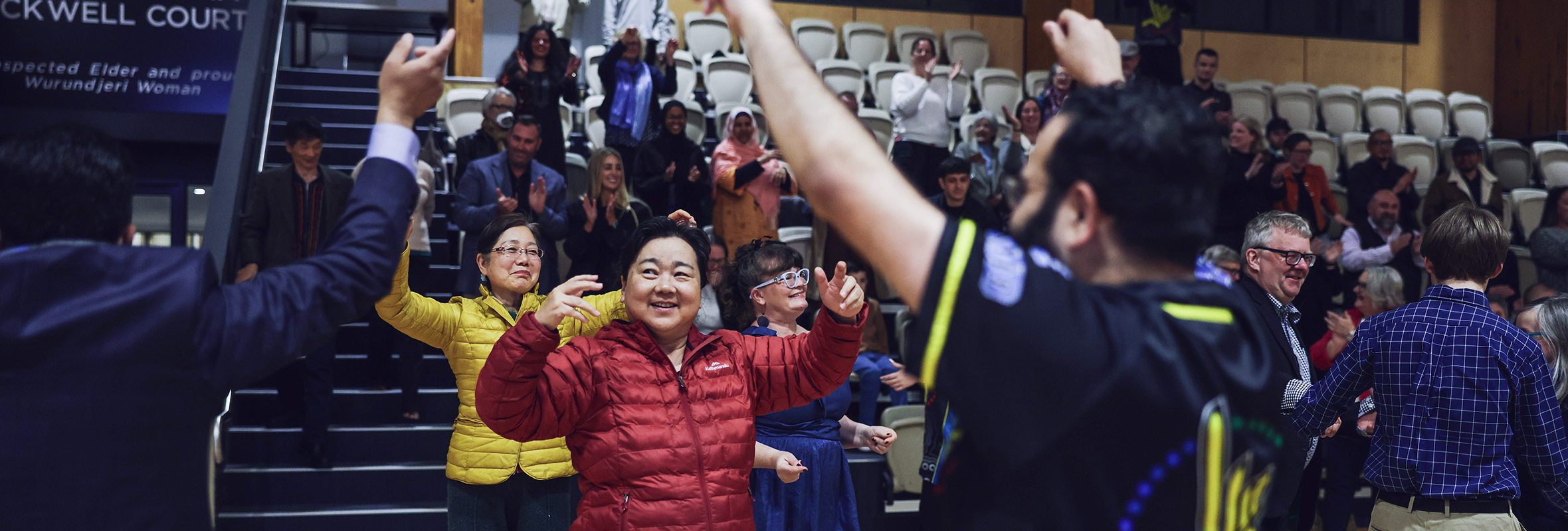 Audience-members-get-up-and-dance-at-the-2024-Darebin-Community-Awards_2300x800.jpg