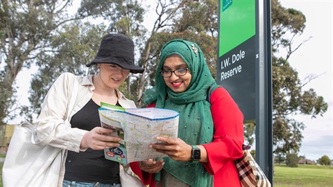 Two people looking at a map