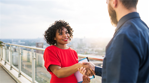 Man and lady shaking hands