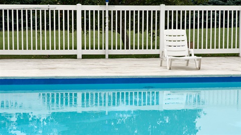 Pool fence with pool chair