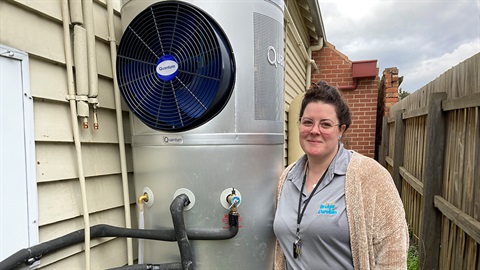 Heat pump installed outside a house