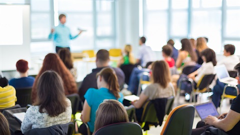 a classroom of people in soft focus