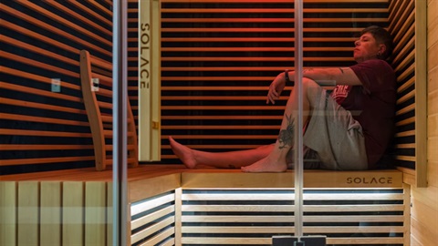 Person sitting in the infrared sauna at Reservoir Leisure Centre